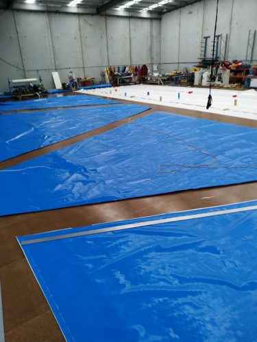 Custom shaped thermal concrete blankets on a manufacturing floor