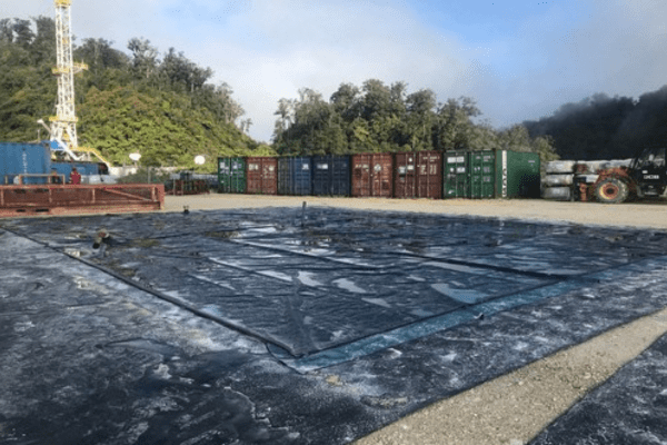 Empty flexible firefighting water bladder tank on a site during deployment 