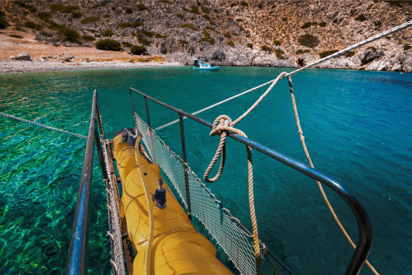 Cylinder-shaped water weight bag for gangways, walkways, and access platforms, made of heavy-duty PVC, positioned near a sea background for marine and offshore load testing applications.